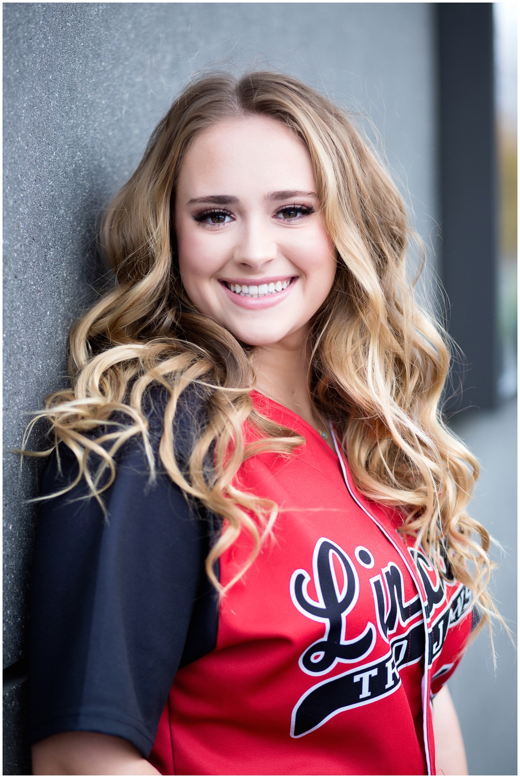 High school girl softball player in jersey